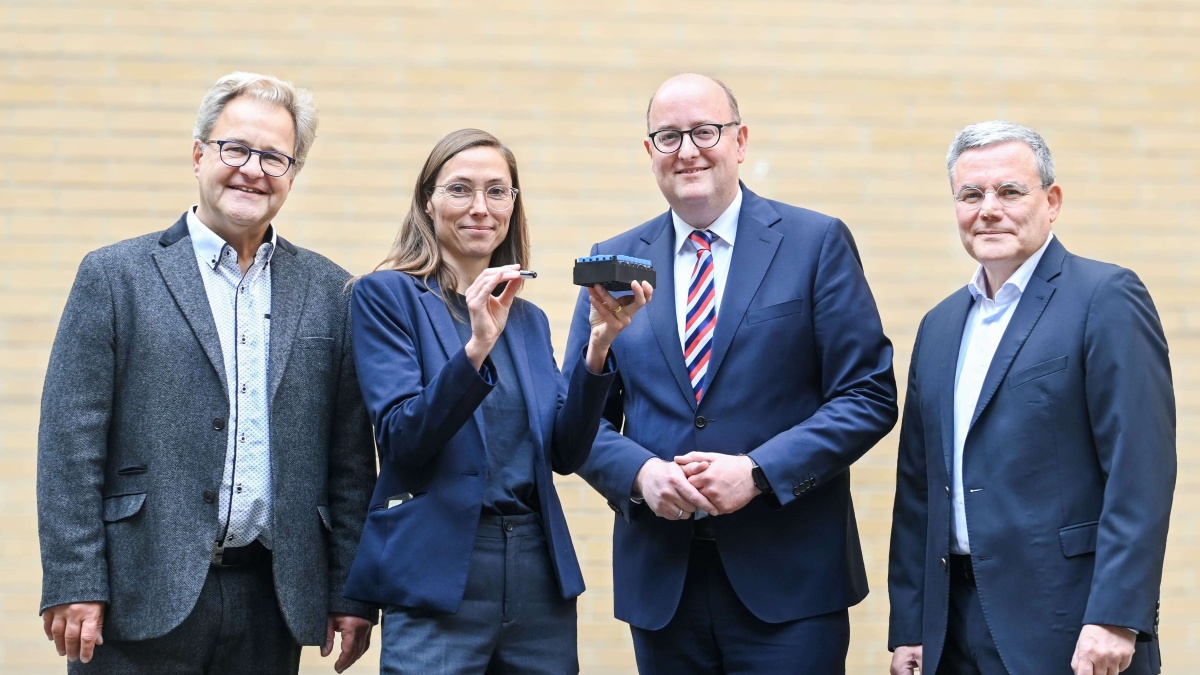 Biobanken-Symposium 2025 Gruppenfoto von Sebastian C. Semler, Dr. Heidi Altmann, Matthias Hauer und PD Dr. Michael Kiehntopf auf dem Biobanken-Symposium 2025.